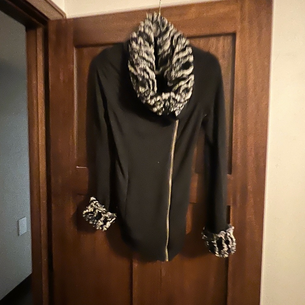 Black cotton zip up with fur collar and sleeves.  Size medium